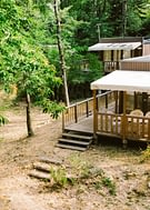 Camping Héliomonde - Verhuur cottage op een naturistencamping