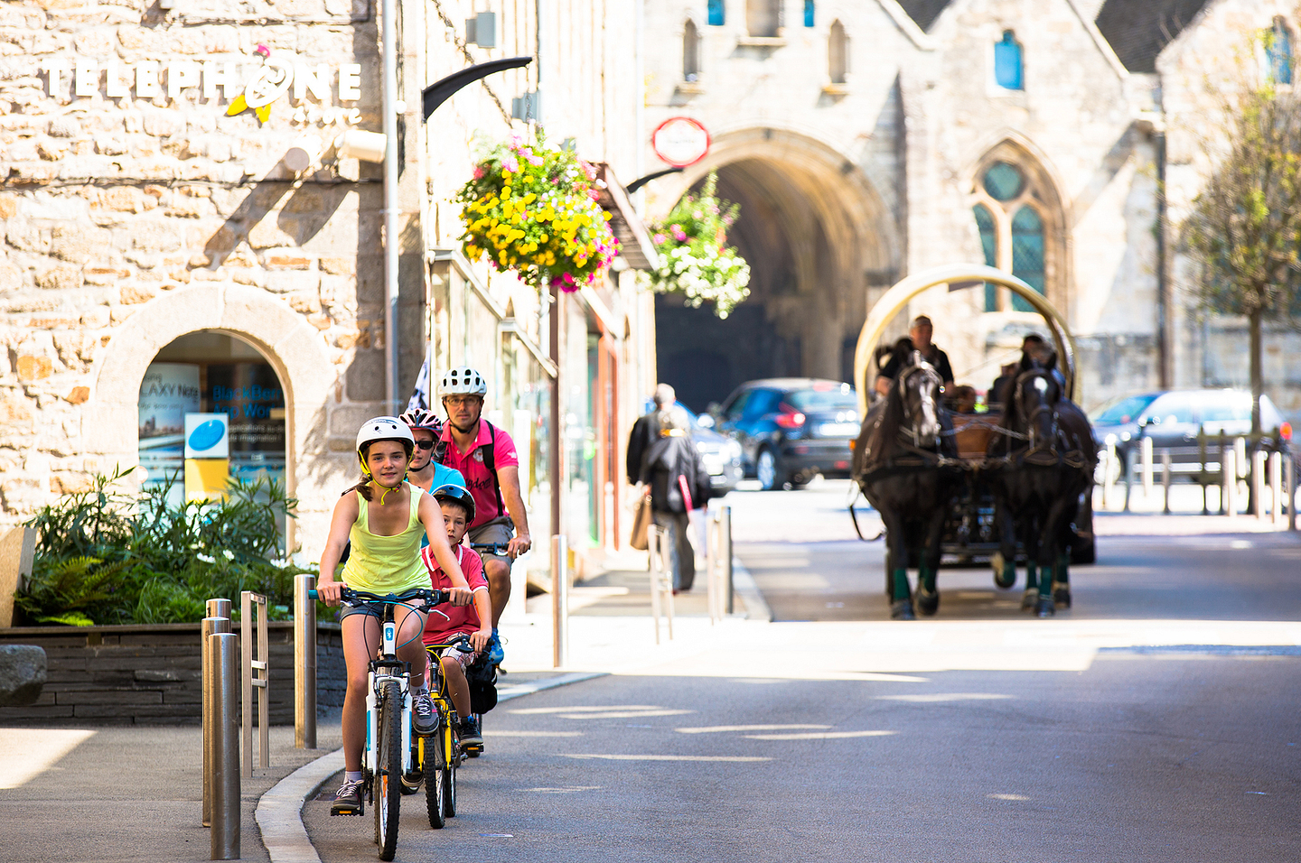 Bikes and horse in the town centre of Saint Pol de Léon © Simon Bourcier