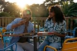 Le Logis Campsite - Services - Couple eating pizza on the terrace bar at the snack bar