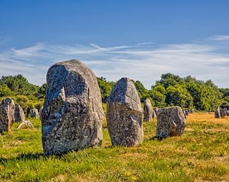 Le Moténo Campsite - Morbihan - Sun shining on Carnac Menhirs, UNESCO world heritage site