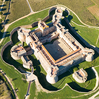 Aerial view of the Catalan fortress Fort de Salses on a sunny day, France