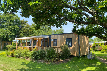 Cottage Confort Premium 3 chambres avec terrasse XXL dans un quartier piétonnier et parc paysager au camping Domaine de Mesqueau