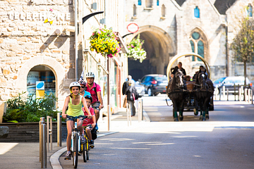 Bikes and horse in the town centre of Saint Pol de Léon © Simon Bourcier