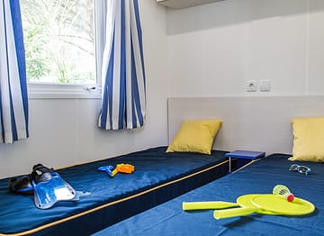 Camping la Sirène - Accommodaties - Sirène 2 - 4 personen - 2 slaapkamers - Kinderkamer