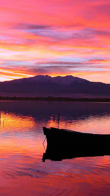 Campingplatz Le Brasilia, Cottage Les Créoles, Sonnenuntergang, Teich