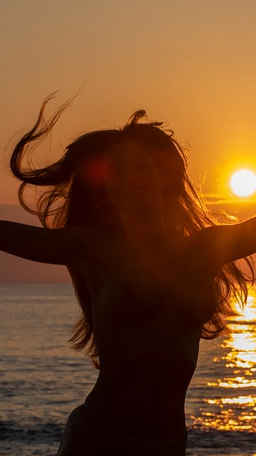 Domaine de Bagheera, Beach, Woman dancing on the beach