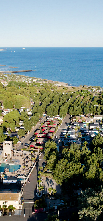 Camping Californie Plage - The swimming pool area - Aerial view of the facilities
