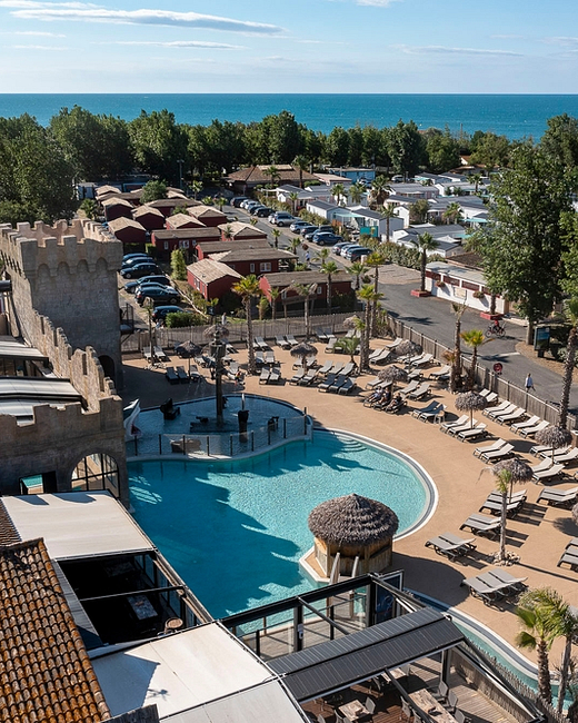 Camping Californie Plage - The swimming pool area - Aerial view of the swimming pool area