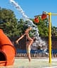 Campingplatz La Sirène - Aquapark - Planschbecken - Badelandschaft - Vater und Tochter unter einem Wasserstrahl